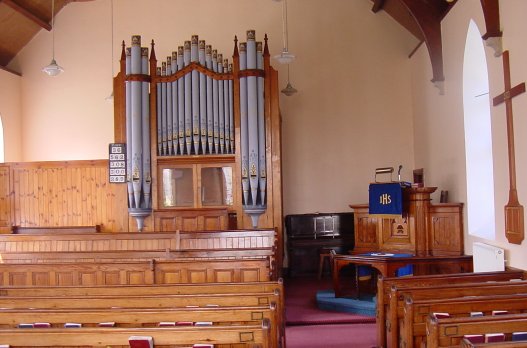 The interior of Hellesveor Chapel with organ and pulpit