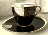 a tango coffee cup/saucer in Gold/White/Green