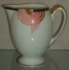 a tango cream jug in red