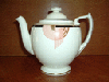 a tango tea pot in red